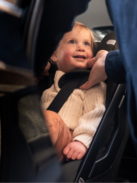 Girl in a rear-facing car seat