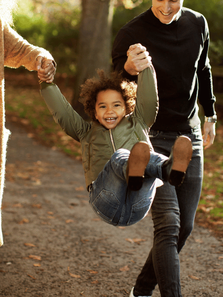 lifestyle image boy singing happily holding parents mobile