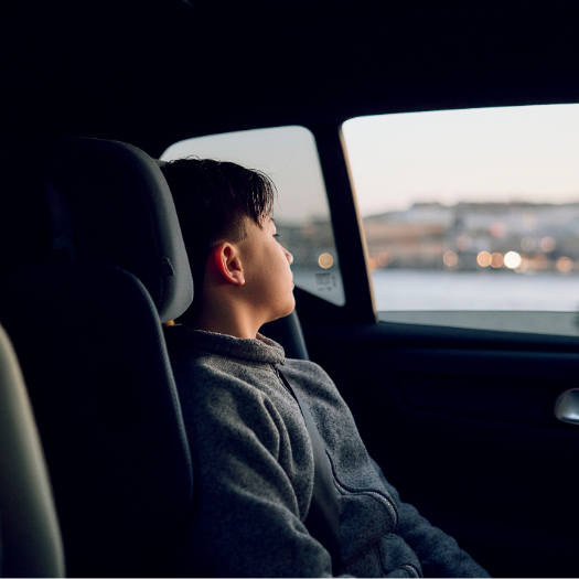 Boy in booster seat - Up